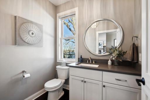 1/2 bath on the main floor with stunning lake views right off the 3 season porch