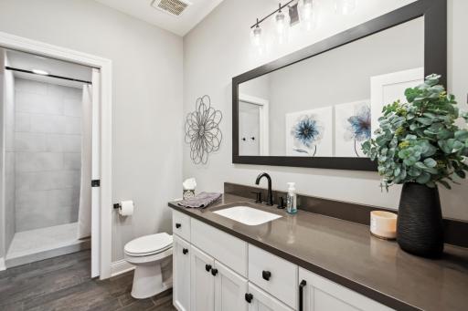 Lower-level 3/4 bathroom perfect for access when coming in from the lake