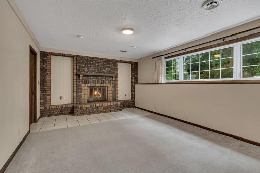 Family room w wood burning fp