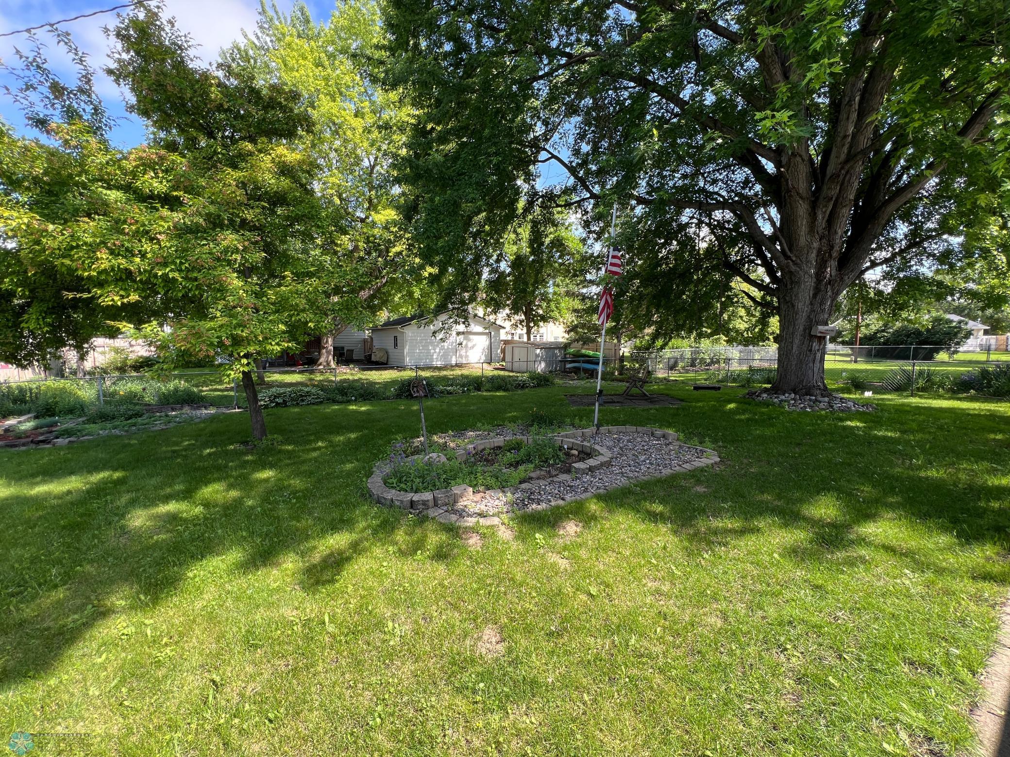 Fully Fenced with Mature Trees