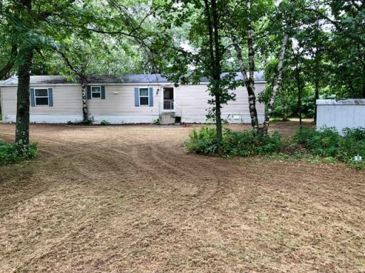 Well maintained home with storage shed. Private and shaded with large mature trees