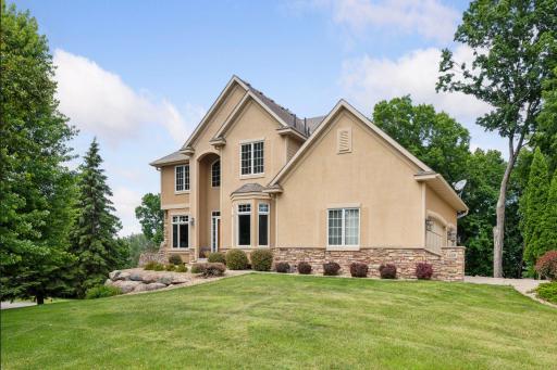 Almost 1/2 acre lot! Gorgeous, custom built, Prior Lake Two-Story! Beautiful landscaping and standout curb appeal!