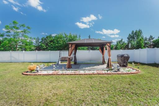 307 E Hayden Lake Rd Champlin-print-012-044-Back Yard-4200x2800-300dpi.jpg