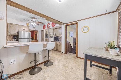 Kitchen's eat-in area & doorway to pantry.