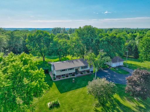 Tucked away on 2.3 acres of peaceful countryside, this 4 bed, 2 bath home is full of warmth & character. Enjoy the tranquility of country living with the convenience of being just minutes from town, Hammond Golf Club, and Pheasant Hills Golf Course.