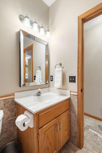 3/4 Bathroom with marble tile on Main Level