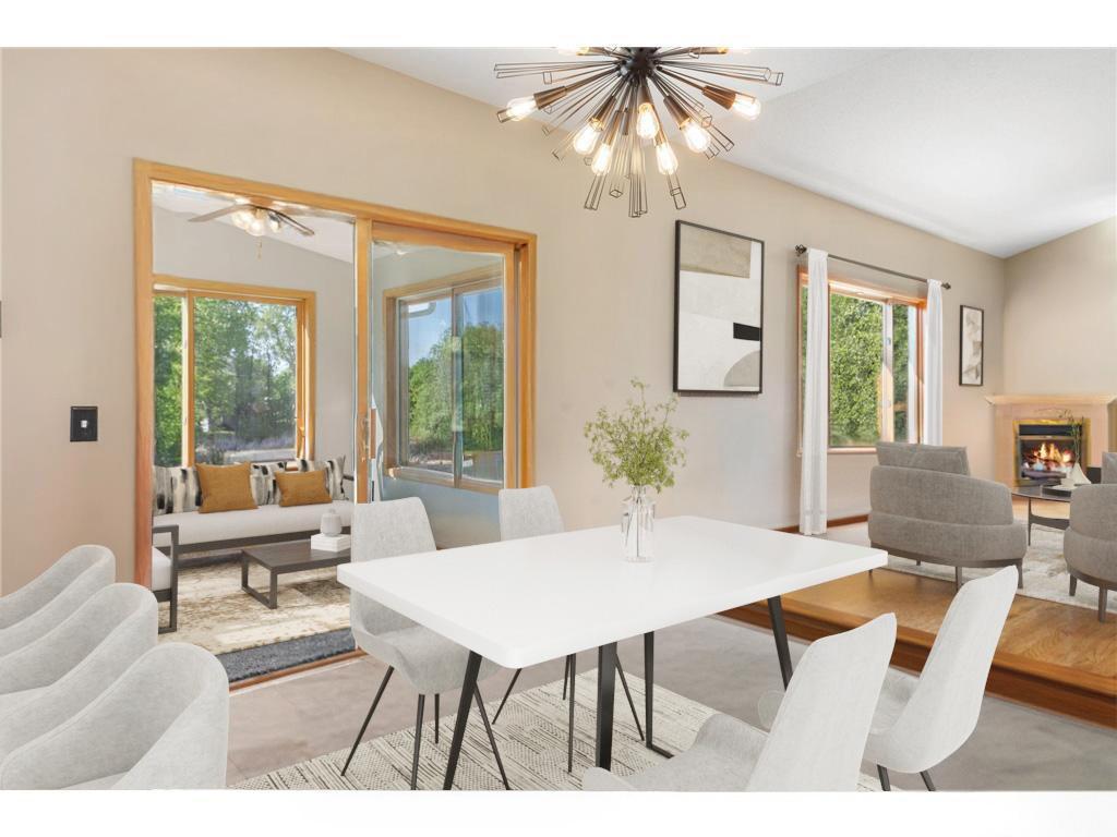 Dining Area with updated light fixture- virtually staged furniture
