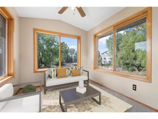 Cozy porch with amazing views- virtually staged