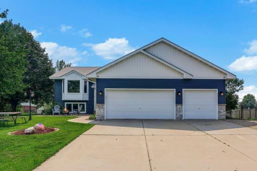 Spacious 3-Car Garage – Room for Vehicles, Tools & More!