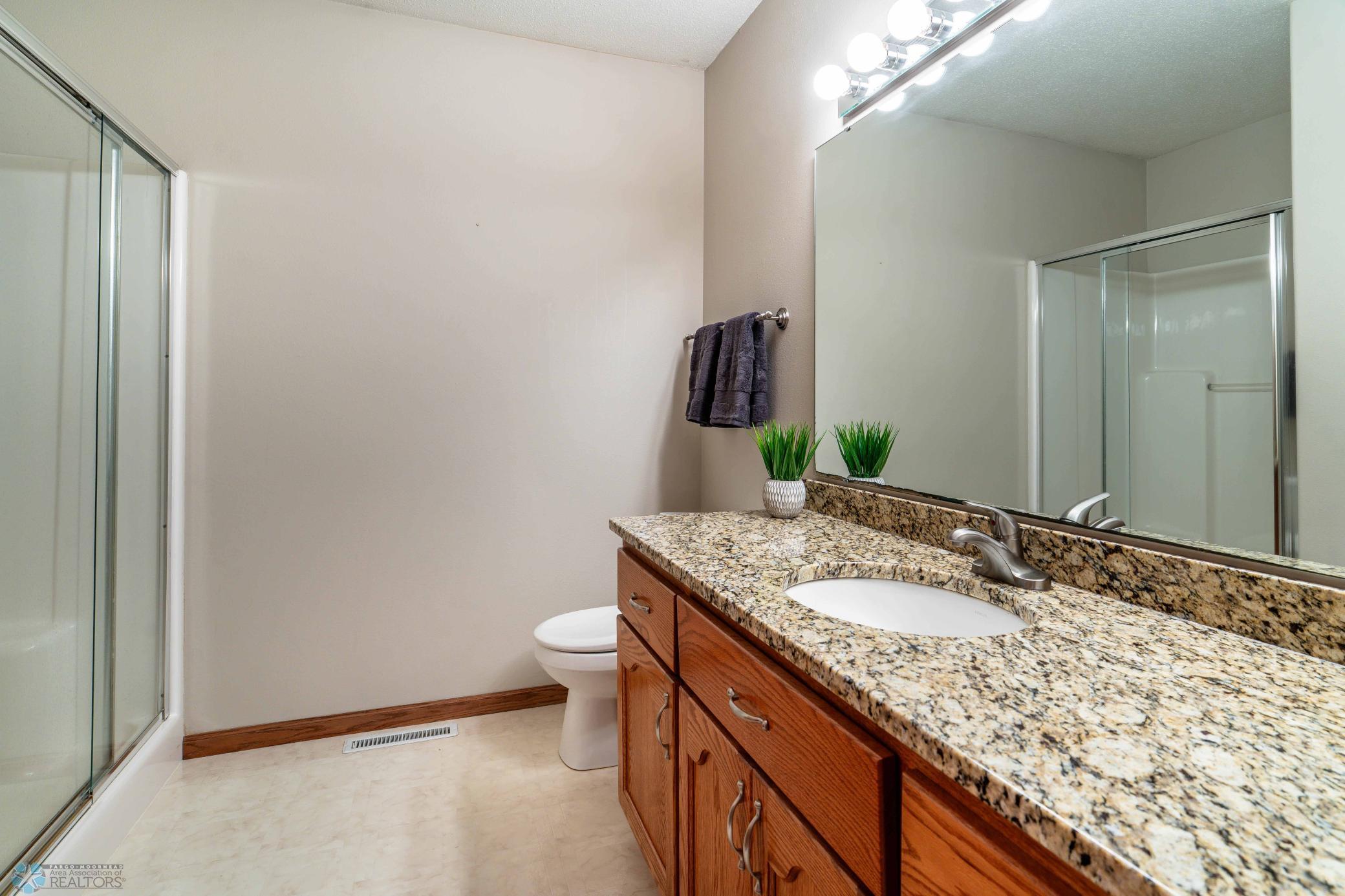 Bathroom w/ Stone Counters