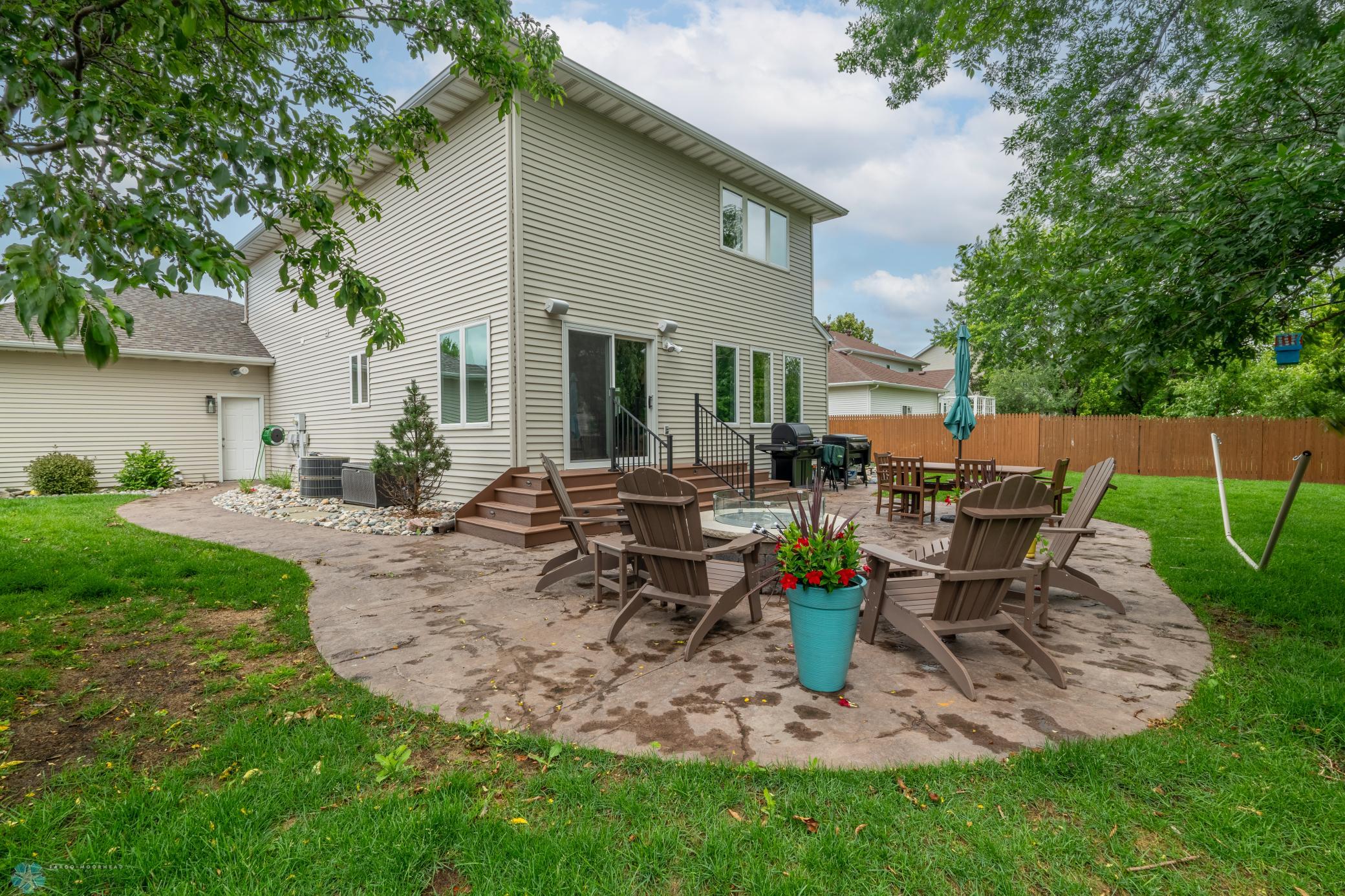 Huge stamped patio w/gas fire pit