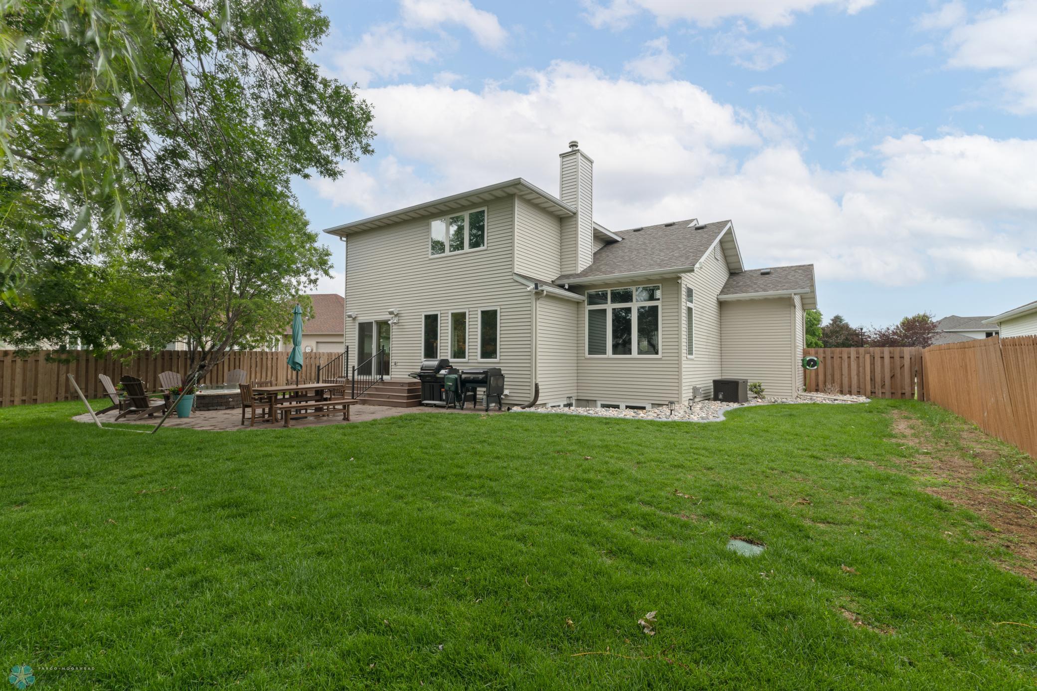 Fully-fenced backyard w/sprinkler system
