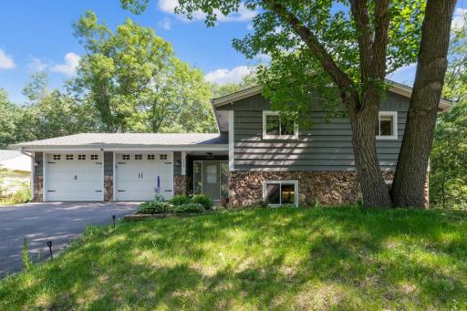 Beautiful corner lot featuring mature trees and ample sunlight
