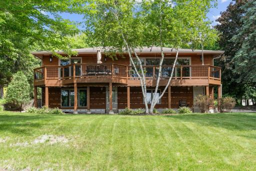 Deck offers panoramic views of both the backyard and the lake.