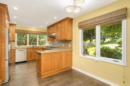 A cozy eat in nook can be found in the kitchen.