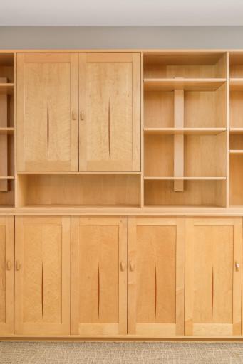 Stunning custom bookshelf with insets will stay with the home.