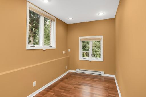 Main floor den that overlooks the private backyard.
