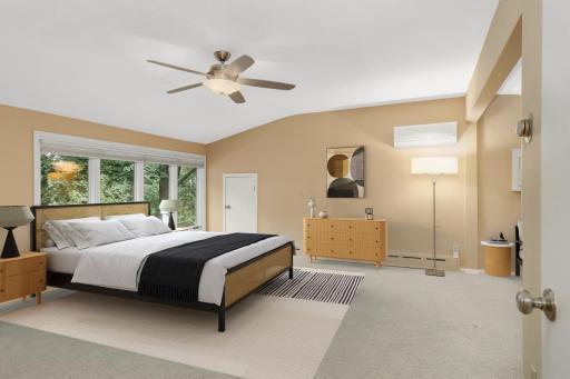Upper level primary en suite with walk in closet.