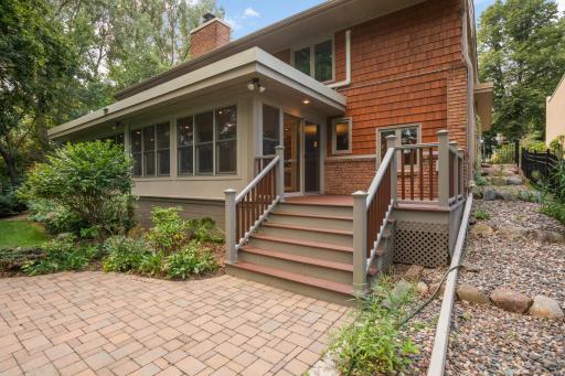 Low maintenance deck and patio just off the sunroom.