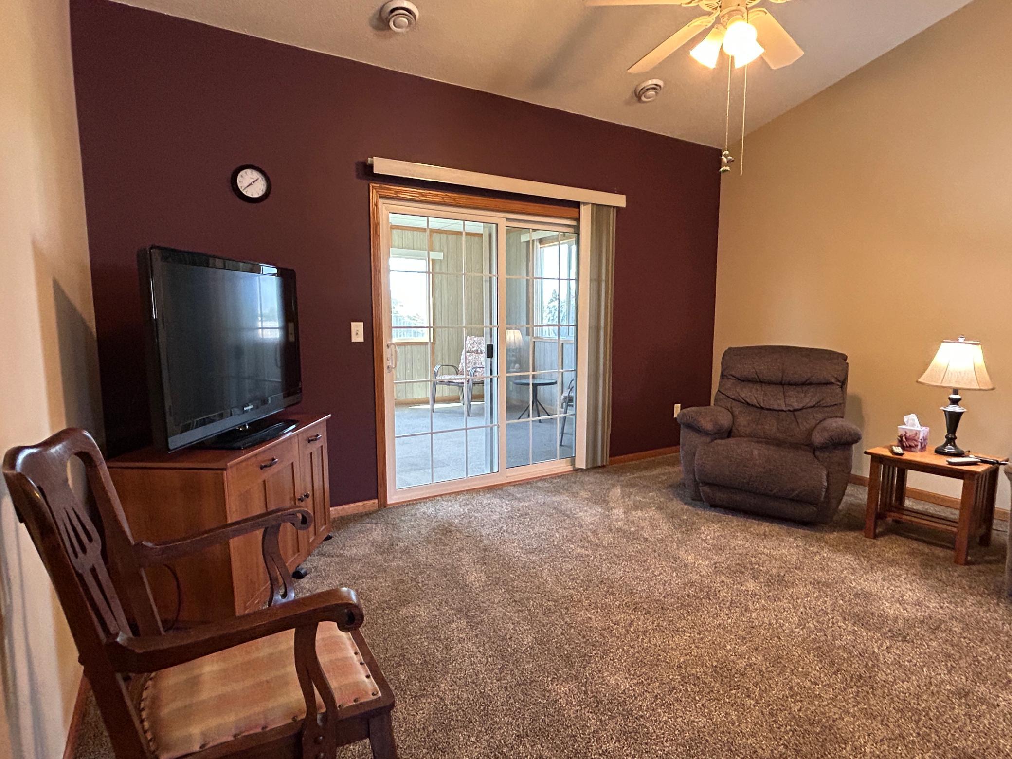 Living Room And Three Season Porch.JPG
