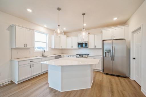 *Photo of the same floorplan in another community, actual features may vary