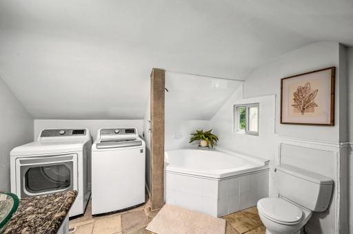 The upper level full bathroom offers easy access from every bedroom.