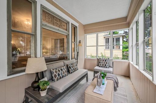 Upon entering the home, you are greeted with a generous front porch with a new entryway door and beautiful stained glass windows.