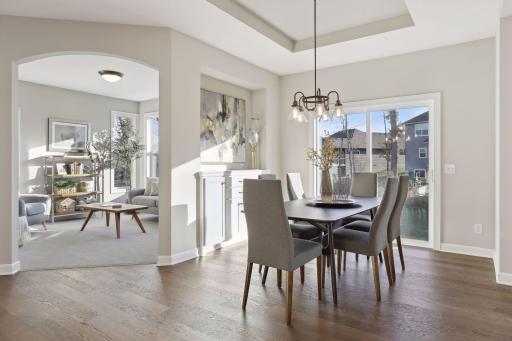 The informal dining room is just steps away from the kitchen. (Pic of a previous model)