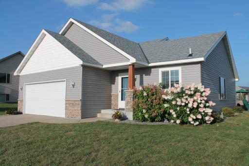 Welcome to 1508 6th Ave S Sartell, MN. The curb appeal is spot on. Gorgeous perennials/bushes adorn the outside of the home. Sharp exterior color contrast draws you in.