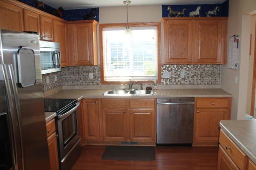 Plenty of countertop space with additional area to put frequently used small kitchen appliances on the counter. Easy to entertain guests with the great main floor layout. Can entertain guests from the kitchen all the way to the living room.