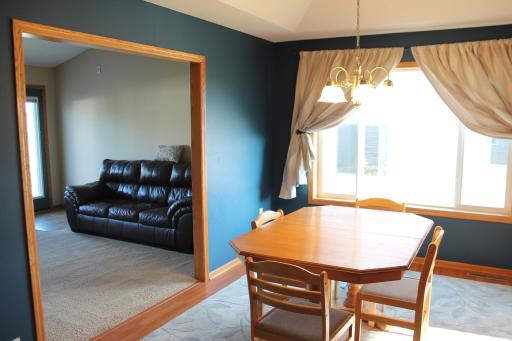 Very large formal dining area that sits conveniently between the living room and kitchen. The coved ceiling makes this space feel elegant and an executive feel.