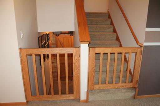These gates are custom built and sturdy! They are staying with the new owners and really tie in with the cedar wall/sliding barn door.