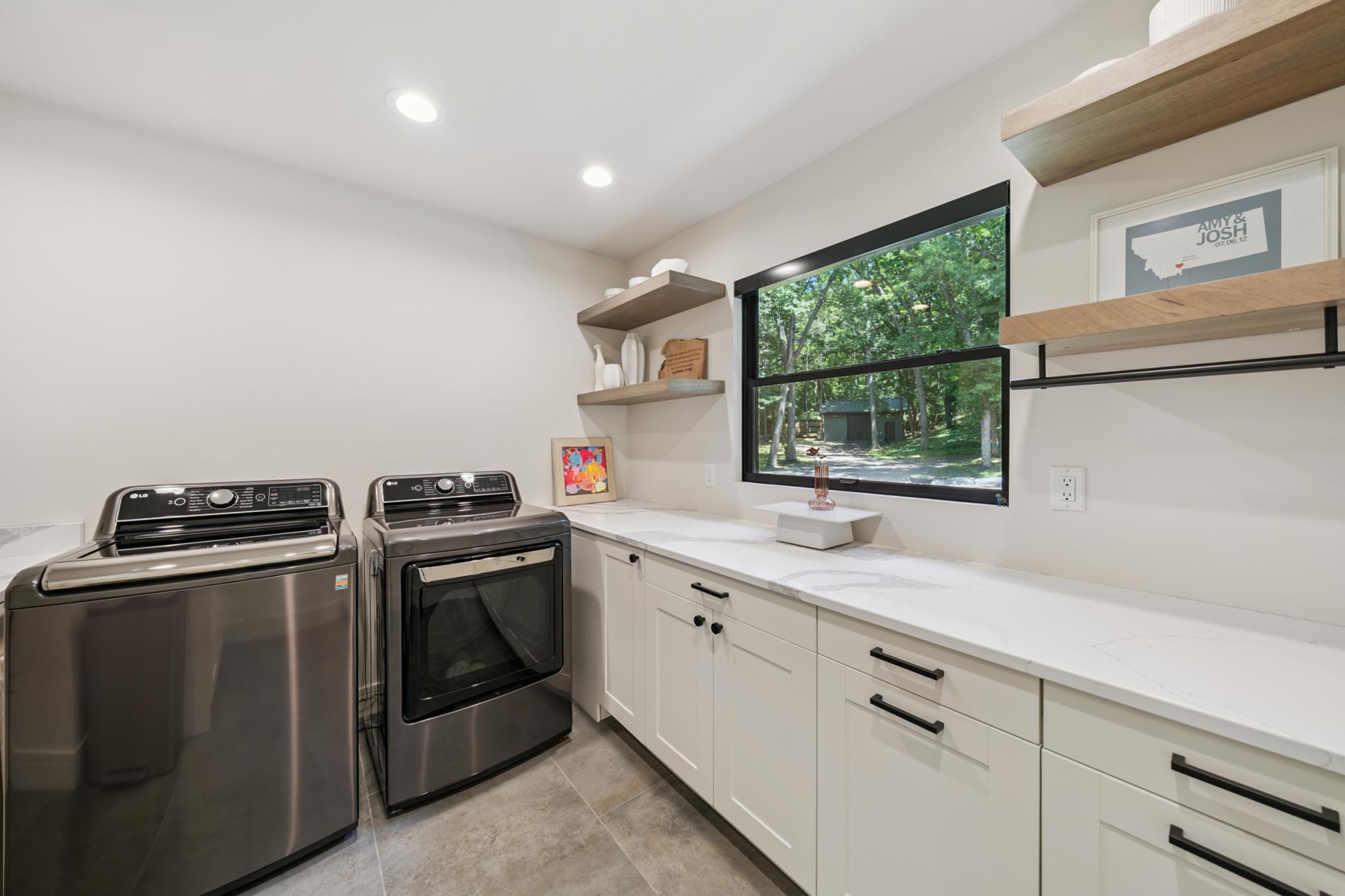 laundry room with ample storage
