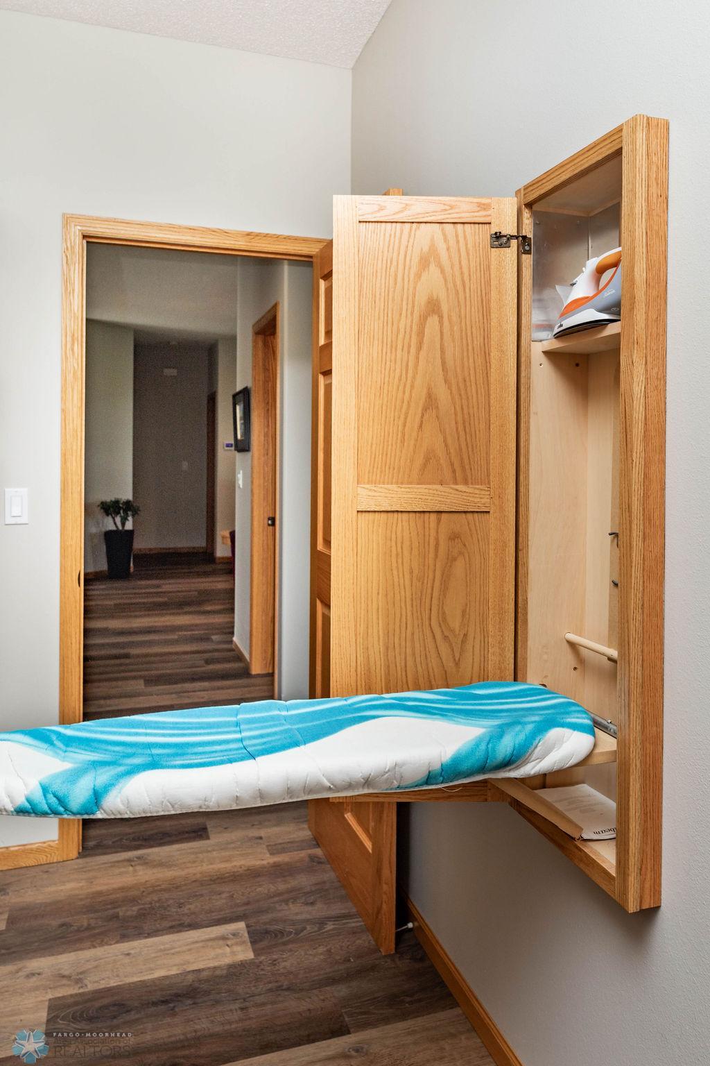 Check out this HIDDEN IRONING BOARD