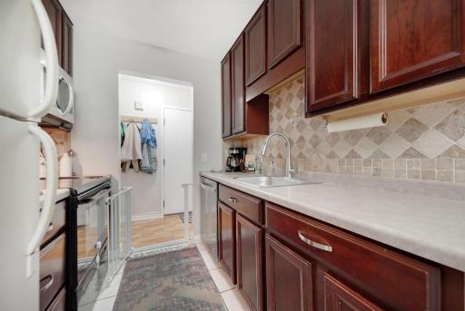 Welcome home!
Warm wood tones and updated backsplash