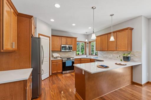 The kitchen just had new quartz countertops and a marble backsplash installed (2025).