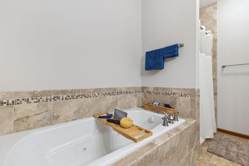 The primary bath also has a separate tup and shower.