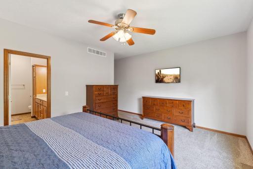 This room is quite large with an en-suite bath and walk-in closet.