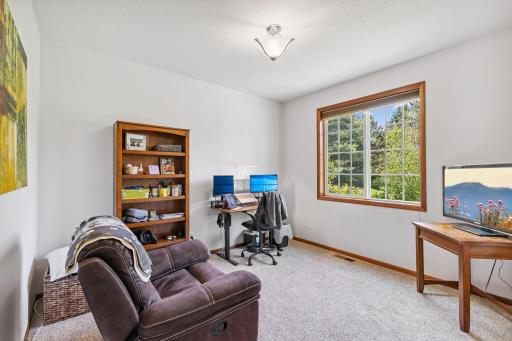 The second main floor bedroom is currently being used as an office.