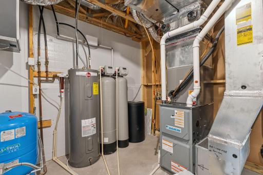 The mechanical room is decent sized and has room for some storage as well.