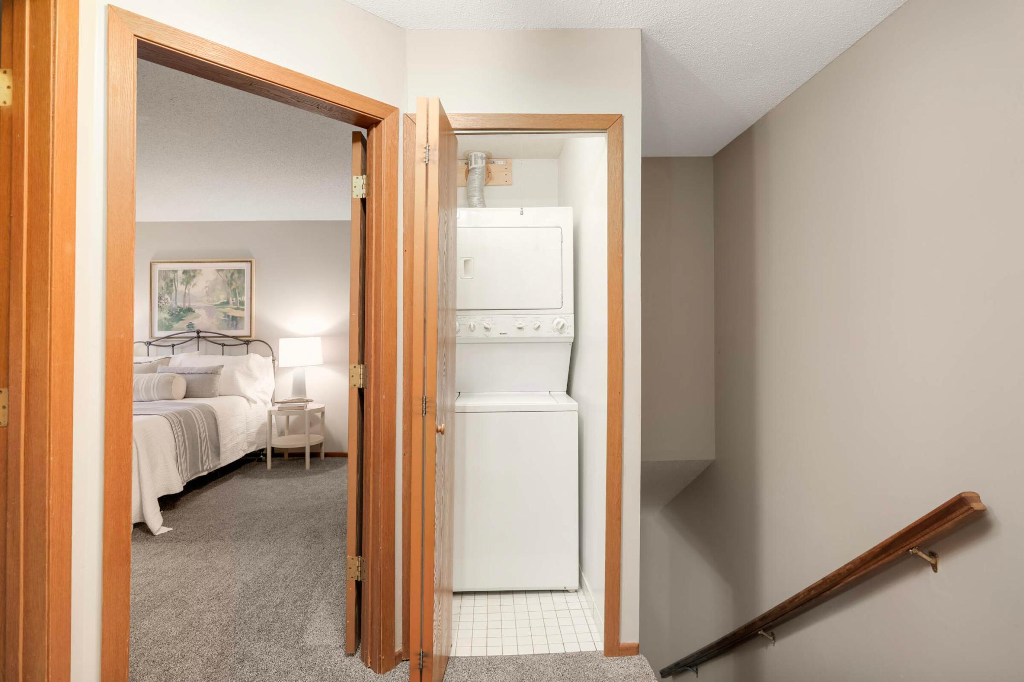 Upper level washer dryer