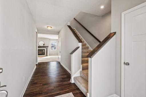 Walk in to a large and inviting main entry with front coat closet