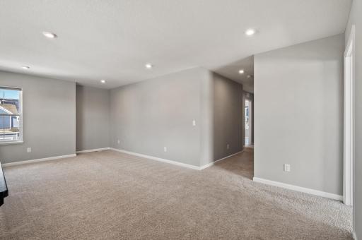 Upper level loft area. Perfect for a family room or play room