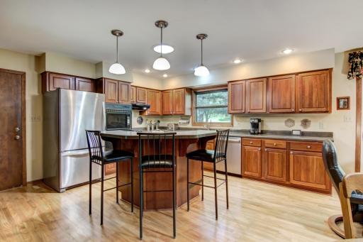 Great working counter space in the kitchen including convenient center island w/breakfast counter seating!