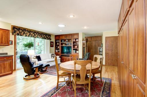 Patio leads out to rear wood deck that overlooks a private backyard beautifully landscaped!