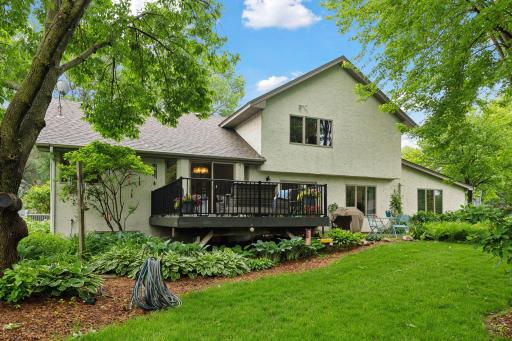 Beautiful backyard with perennials and tons of Hosta's that come up on their own.