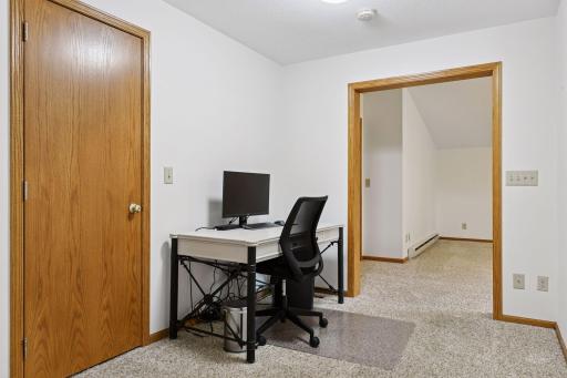 Main level office space or ideal if buyers wanted to add another bathroom for primary bedroom behind. Walk in additional closet backs to water so easy to do.