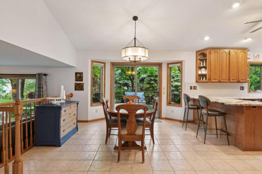 Informal dining space or counter top eating with direct access to deck and the flat backyard.