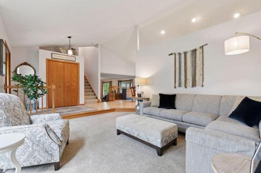 View towards family room and kitchen area along with additional 3 upper bedrooms as ML primary is IDEAL for those seeking ML living in a home that is not a townhome.