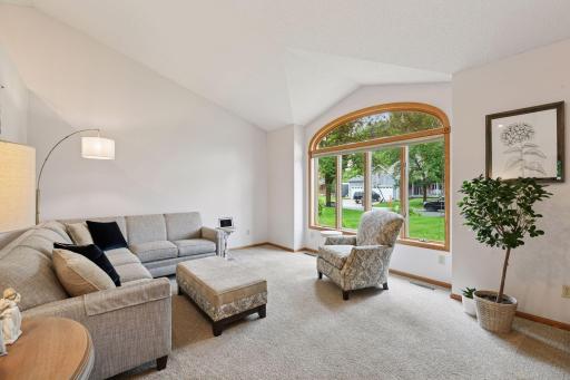 Front room welcomes you with vaulted ceilings and big front picture window.